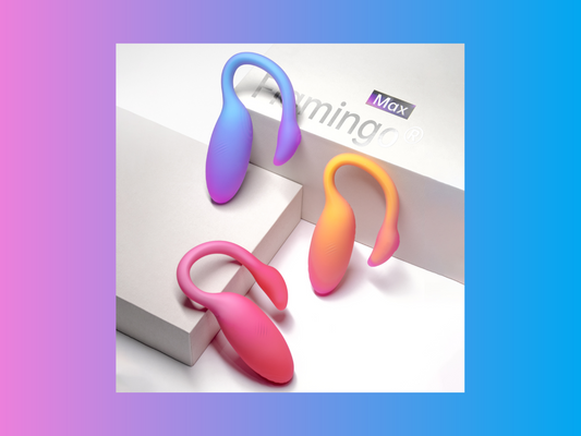 Three gradient Magic Flamingo Max wearable vibrators on white blocks.