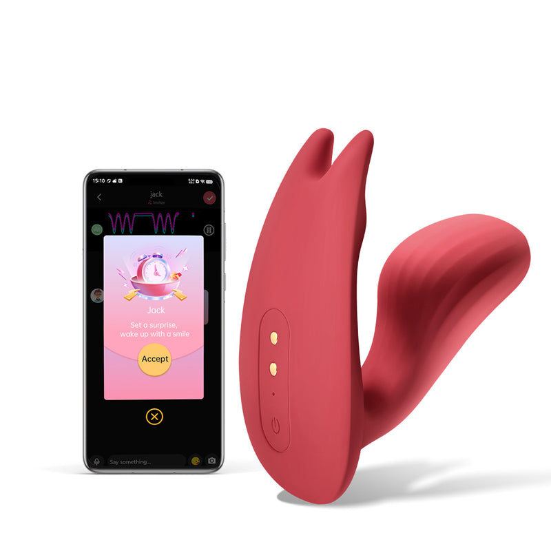 Magic Umi dual-motor wearable vibrator beside Magic Motion App alarm screen