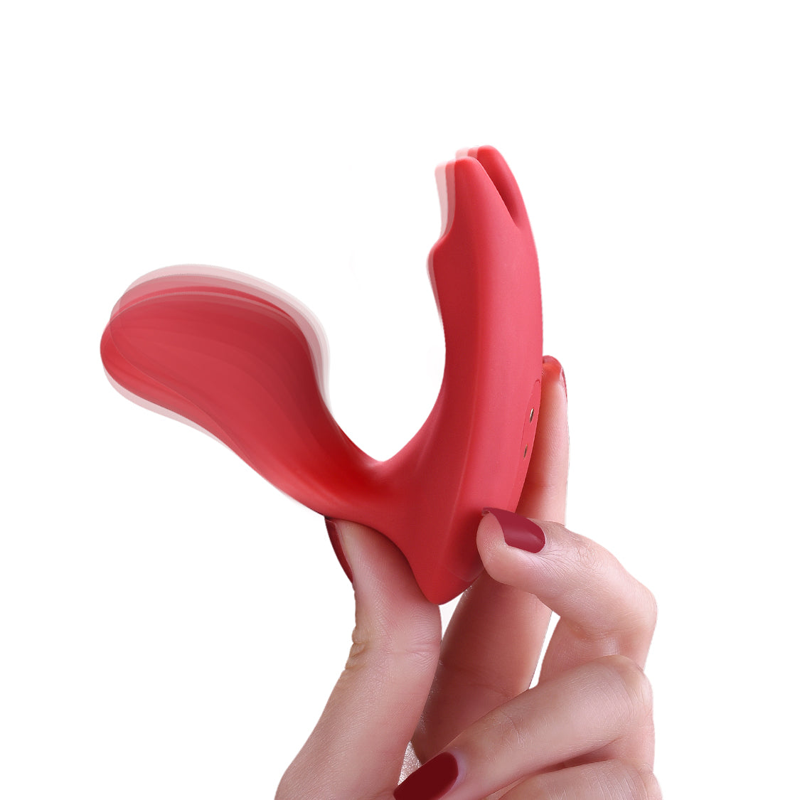 Hand holding Magic Umi dual-motor wearable vibrator