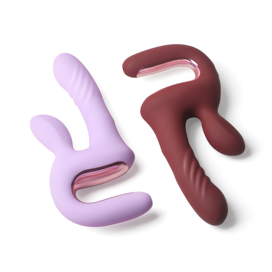 Magic Duet app-controlled thrusting rabbit vibrators in Red and Purple