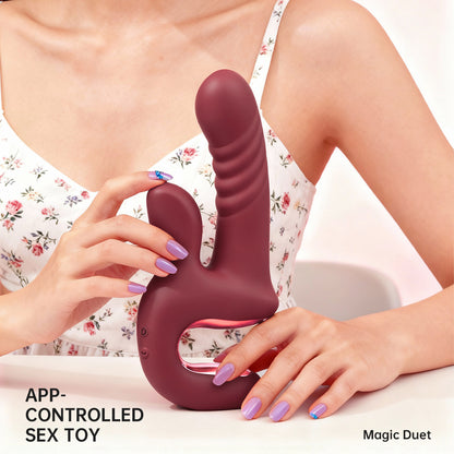 Red Magic Duet app-controlled vibrator held by a model