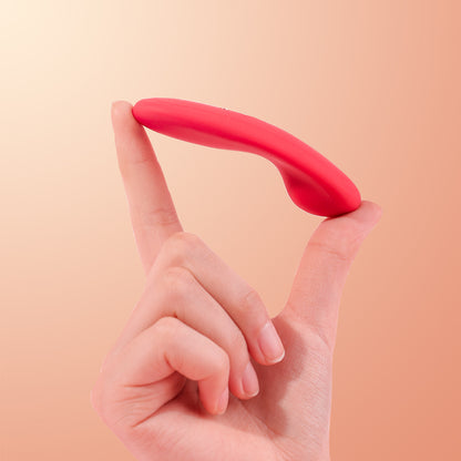 Hand holding Magic Nyx slim external wearable vibrator