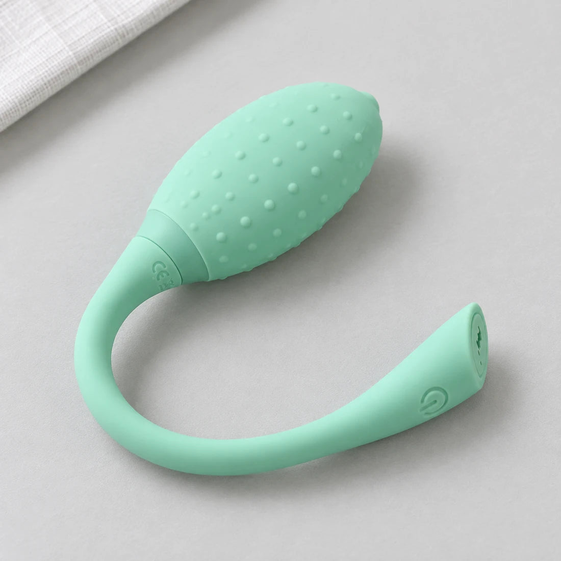 Mint green Magic Fugu showing its textured body and curved tail